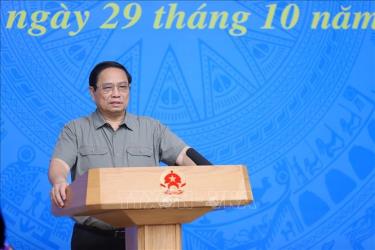 Thủ tướng Phạm Minh Chính chủ trì Hội nghị tổng kết công tác phòng, chống dịch COVID-19. Ảnh: Dương Giang/TTXVN